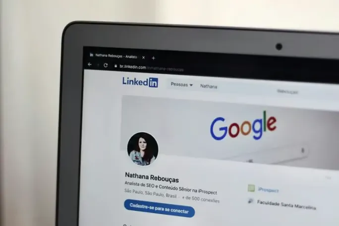 Close-up of a LinkedIn profile on a laptop screen.